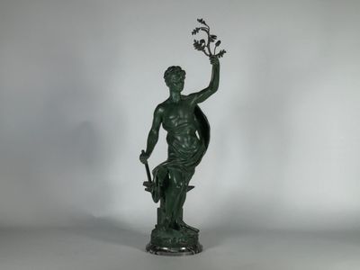 une image représentant une statue d'un homme tenant une plante