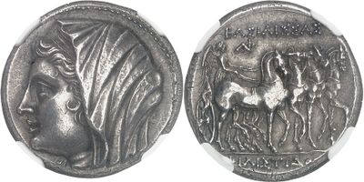 a close up of a silver coin with a woman on it
