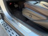 a close up of a car door with the door handle open