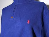 a close up of a blue sweater on a mannequin mannequin mannequin mannequin mannequin mannequin mannequin manne