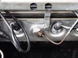 a close up of a car ' s dashboard with wires attached to it