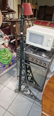 a microwave oven sitting on top of a stove in a room