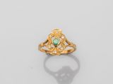 an emerald and diamond ring