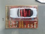 a toy car that is sitting on top of a box
