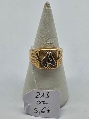 an image of a gold ring with a masonic symbol on it