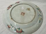 a white plate with a floral design on it