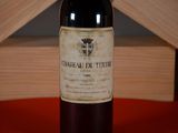 a bottle of wine that is sitting on a table