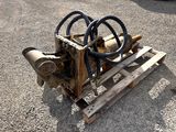 a wooden pallet with a couple of rings attached to it