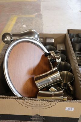 a box with a bunch of cups and pans inside of it