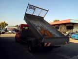 a dump truck that is sitting in the parking lot