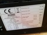 a close up of the back of a machine with a label on it