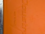 an orange plastic box with the word energie written on it