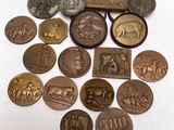 a lot of coins that are sitting on a table