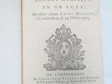 a book with a picture of a coat of arms on it