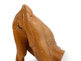 wooden sculpture of a hand holding a piece of wood on a white background
