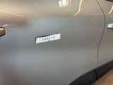 a close up of a car door with a sticker on it