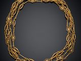 une image représentant un collier en or sur fond noir