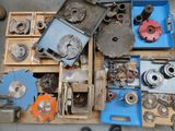 many different types of metal parts in a box