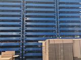 several pallets of pallets are stacked on pallets in a warehouse