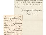 an old letter and a piece of paper with writing on it