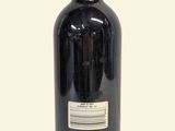 a bottle of wine that is sitting on a table