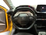 the interior of a car with a steering wheel and dashboard controls