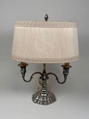 an image of a lamp with a white shade on top of it