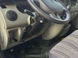 a picture of a car with a steering wheel and dashboard