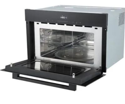 an oven that has a drawer in the middle of it