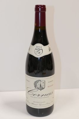 a bottle of wine that is sitting on a table