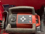 an image of a red tool box with tools in it
