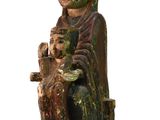 an image of a statue of a woman holding a cat