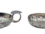 pair of silver plated bowls with handles and handles