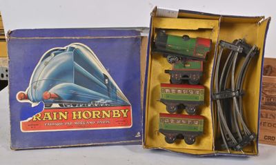a box with a train set in it and a box with a train set in it
