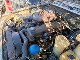 a picture of a car engine with its hood open