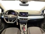 the interior of a car with a steering wheel, dashboard, and dashboard controls