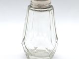a small glass salt shaker with a silver top