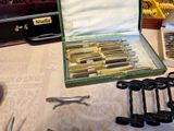 many different types of scissors in a case