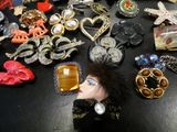 many different types of jewelry on the table