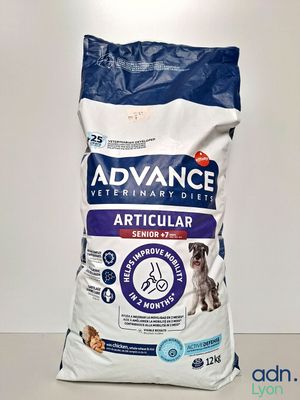 a bag of advance dog food sitting on top of a table