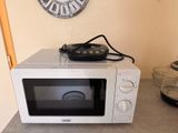 a microwave that is on top of a counter