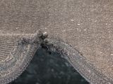 a piece of fabric that has been torn off of a chair