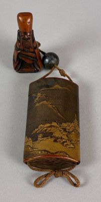 a small case with a picture of a man and a dog on it