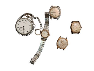 three watches and a watch bracelet are sitting next to each other