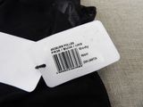 a label on the back of a black jacket with a white tag