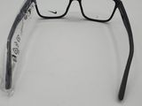 a pair of glasses sitting on top of a white surface