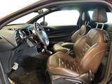 a picture of the inside of a car with leather seats