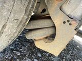a close up of a car ' s tire with a flat tire
