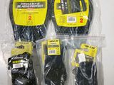 two pairs of gloves and a pair of gloves are wrapped in plastic
