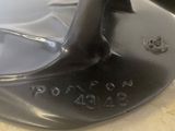 a close up of a golf putter on a counter top